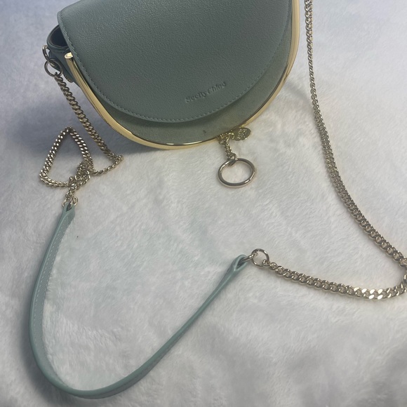 A high-shine bar adds definition to the half-circle silhouette of this elegant. - Picture 2 of 6